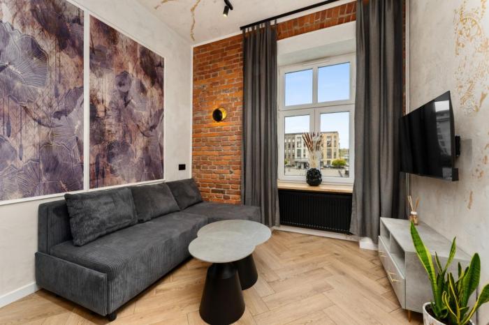 Bohaterów Getta Studio with Mezzanine by BookingHost