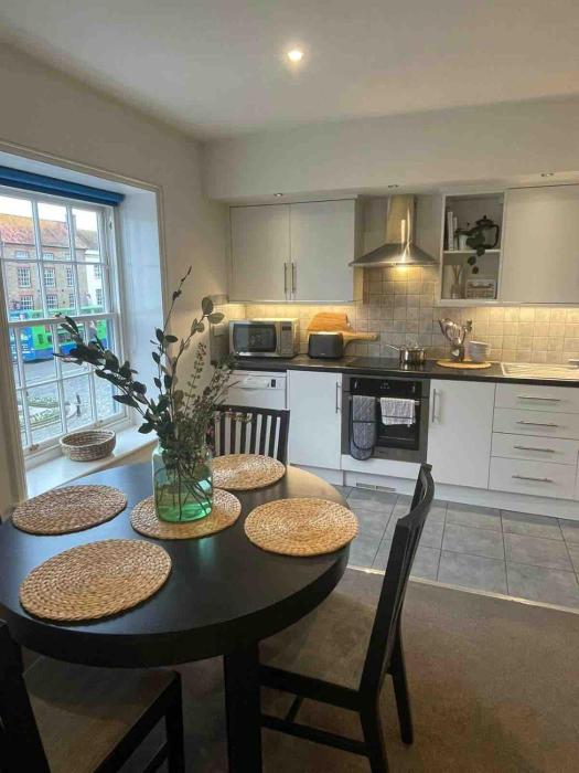 Large town centre apartment with parking