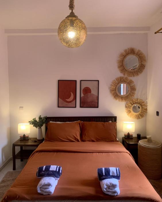 Bel Appart 2 Chambres Tout Équipé - Clim et Parking Gratuit - Majorelle Médina 4min voiture - Wifi Fibre - Check-in Autonome - Idéal Familles - Guéliz