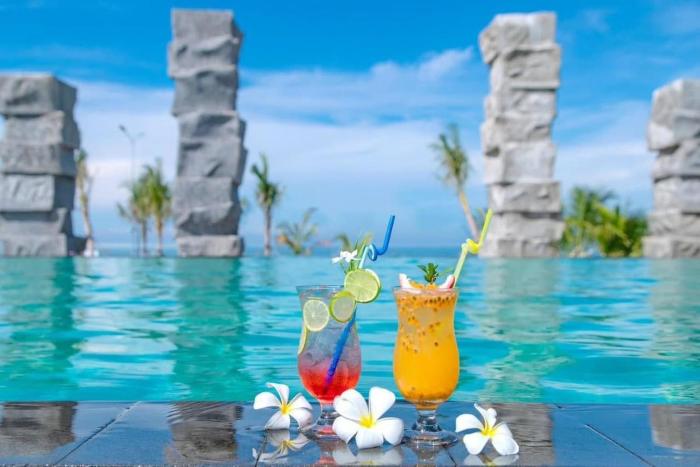 Villa biển kê gà với hồ bơi tràn bờ riêng tư