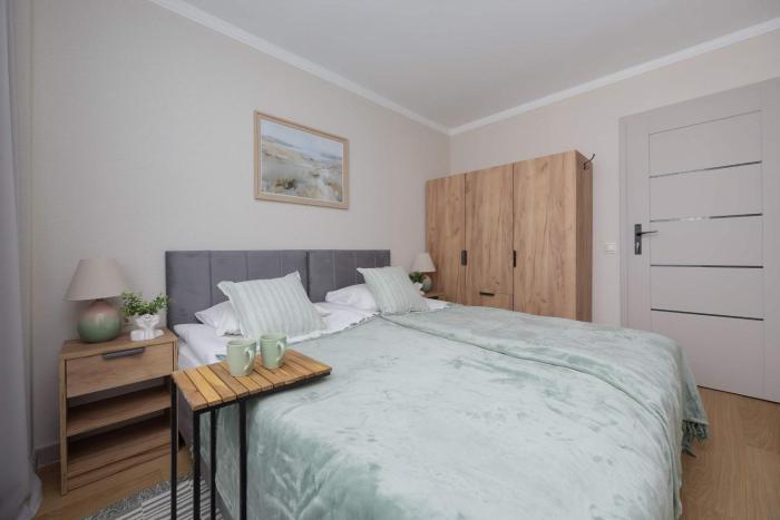 Modern Air-Conditioned Apartment with Balcony by Noclegi Renters