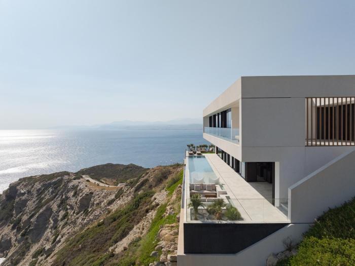 Seafront Cliff Villa with Infinity Pool & Wellness, By ThinkVilla