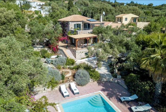 Villa Aeolus Stylish Villa with Pool Masterbedroom with seperate Mezzanine