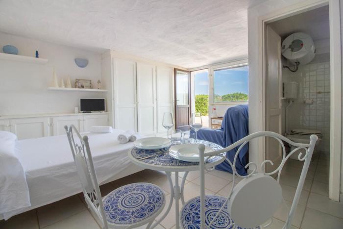 GuestHost - Cozy Open-Plan Apartment in Sardinia