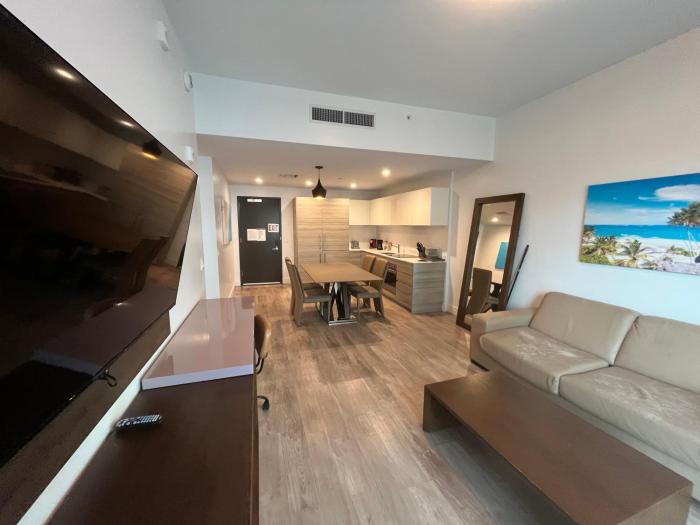 Modern Beachside Condo with Rooftop Pool
