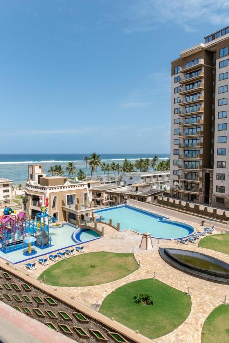 Sandy Shore Beach Apartments - Karibu Quarters