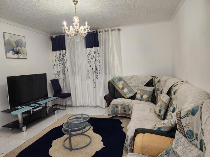 Appartement T4 au RDC dun immeuble