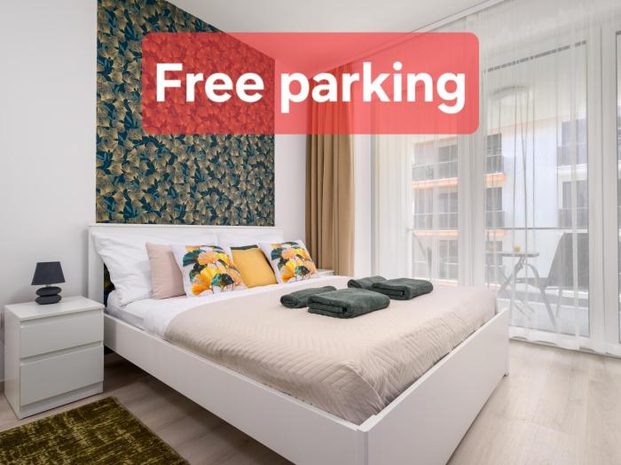NEW home with PARKING by the City Park