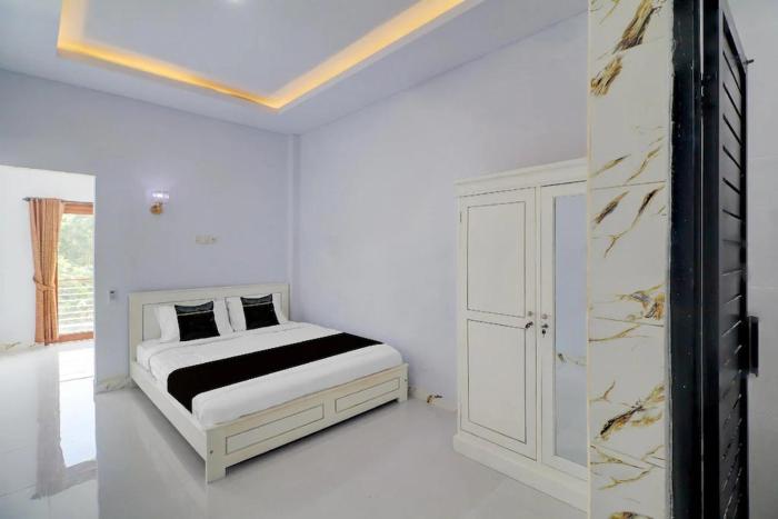Hotel O near Mangusada Hospital formerly Rare Home Cozy Stay Premier 2