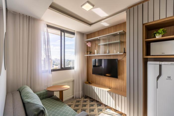 Apartamento ensolarado em condomínio clube