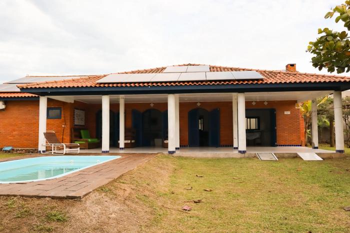 Casa com piscina patio e campinho em torres 1 quadra mar