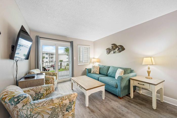 Coastal 2nd floor condo with pools hot tubs tennis balcony & elevator
