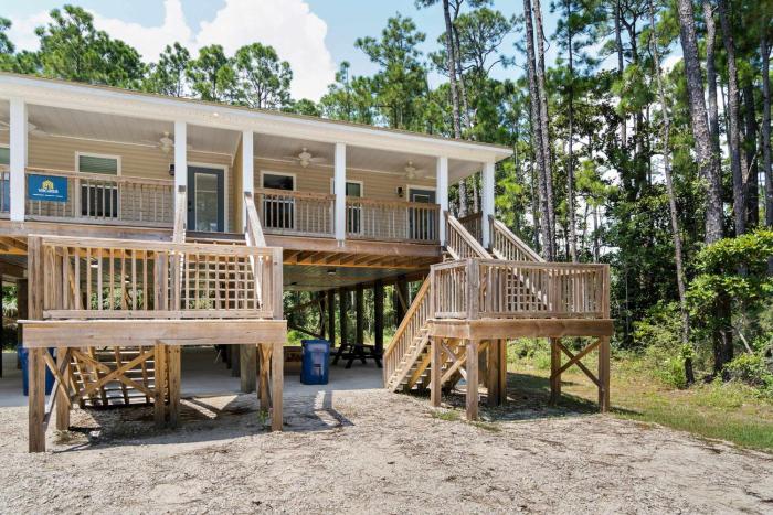 Inviting home near the beach with balcony full kitchen central AC & W&D