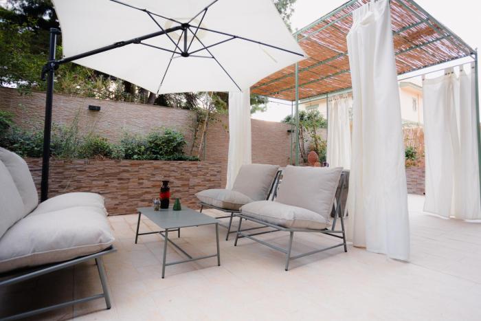 Elegante appartamento con patio a 5 min dal mare