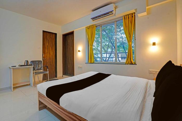 Collection O Dagdu Seth Ganpati Crossway Formerly Malwade Motels