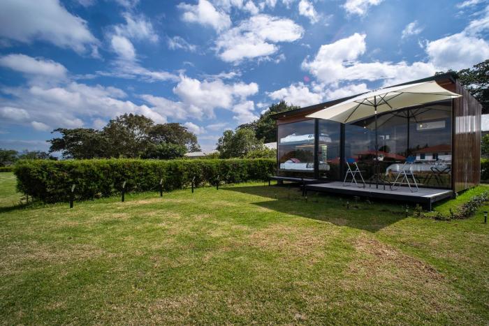 Modern Tiny House Near Quito Airport with Garden, Lagoon & Fire Pit
