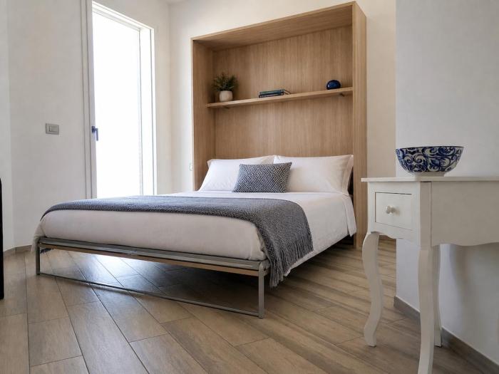 Kennedy house with parking, balcony and 200 m from the sea