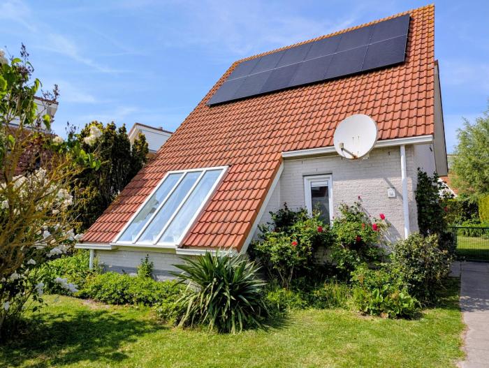 6 Persoons Vakantie Villa, met Sauna en grote tuin aan de Noordzee