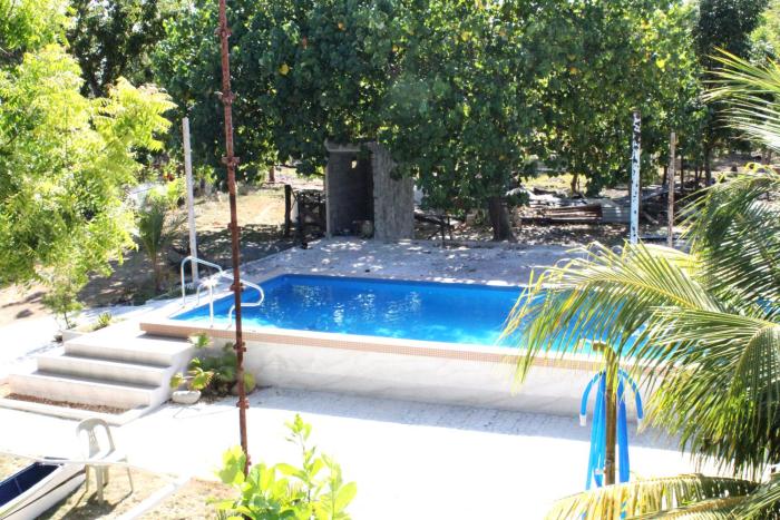 QUAD HOUSE - Olang Island