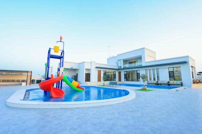 Al Tharaa Chalet استراحة الثراء