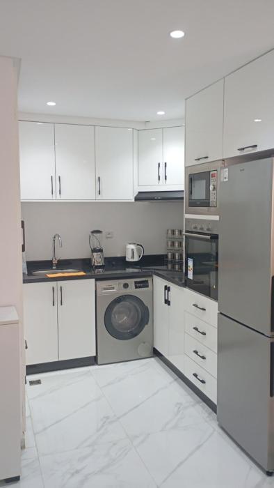 Chic appartement calme à une minute à pied de la plage