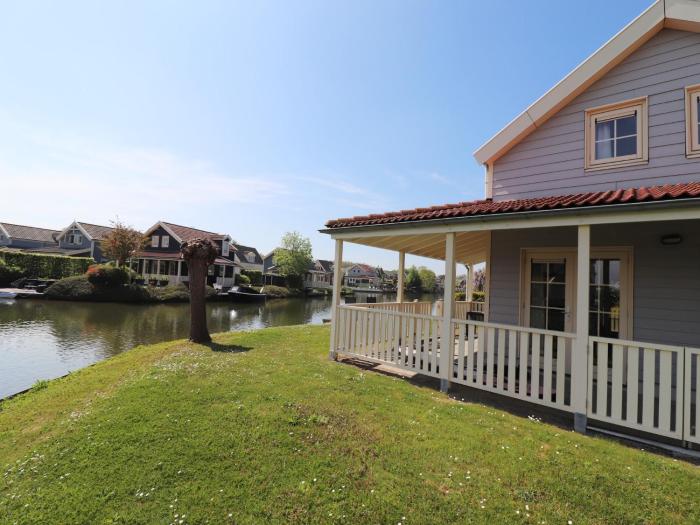 Bungalow by Water near Rotterdam with Sauna