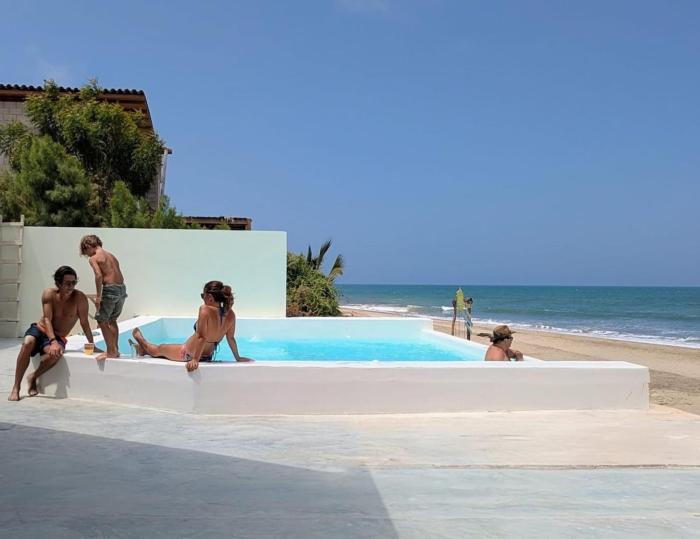 Architect-designed house with pool, beach front