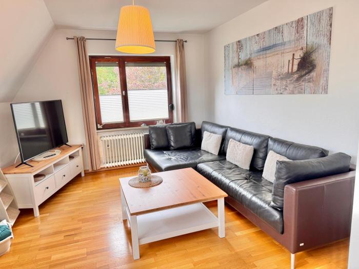 Ferienwohnung mit Balkon und eingezäunten Garten