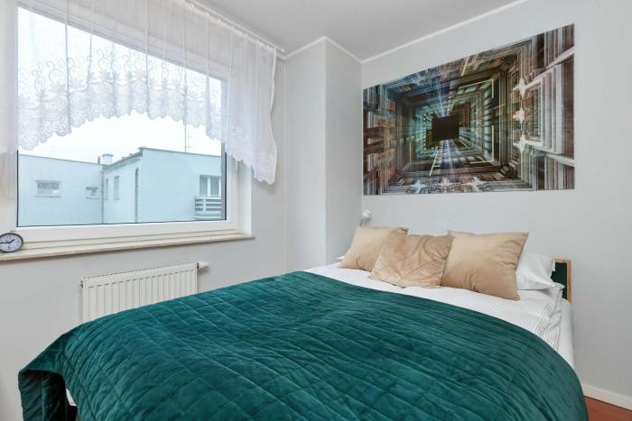 Comfortable Apartment with Parking Close to the Beach by Noclegi Renters
