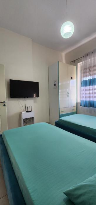 Room with shared bathroom
