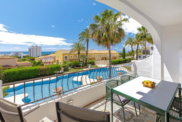 Renovated Apartment with Sea Views and Pool with Private Parking