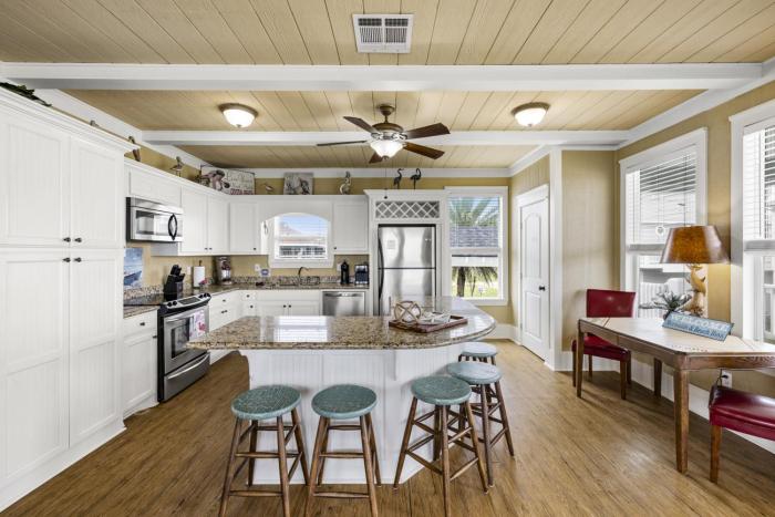 Tiki Bar Golf Cart BBQ Expansive Decks Beach Access