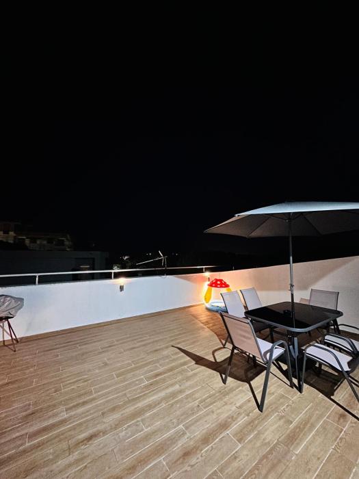 Top Floor Escape by the Sea