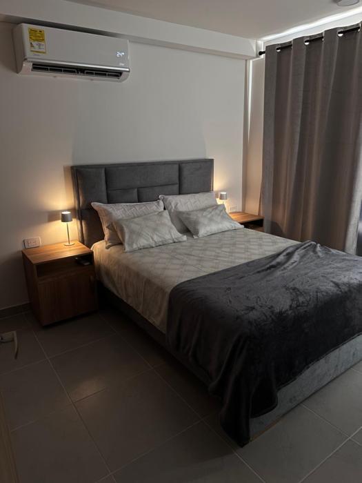 Apartamento Coralina Caribe Residence en Santa Marta cerca al mar - AC, Wifi, balcón, parqueadero