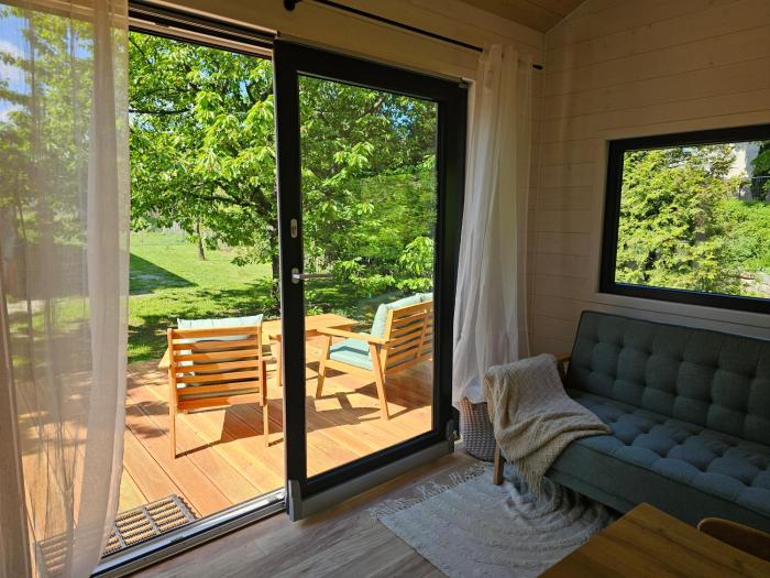 Modernes TinyHouse mit Klimaanlage in privater Atmosphäre