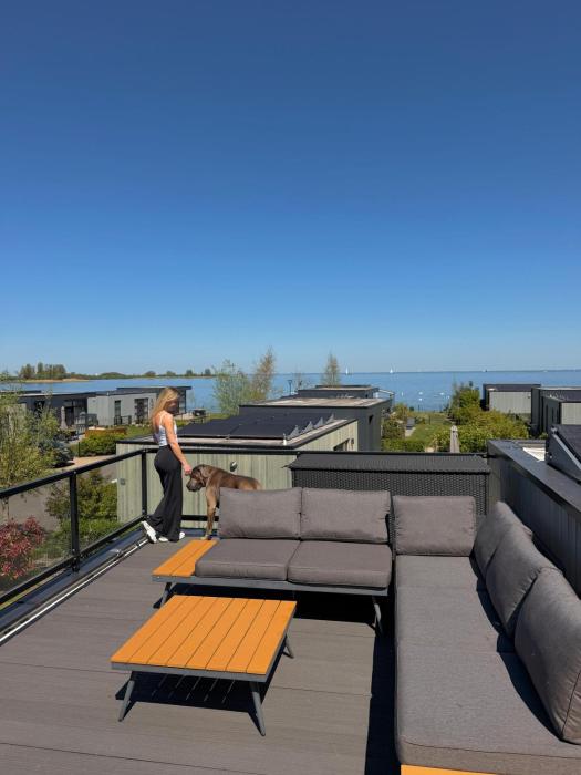 Enkhuizer Strand Cube Elite Paradiso mit Zaun Haus Nr 211