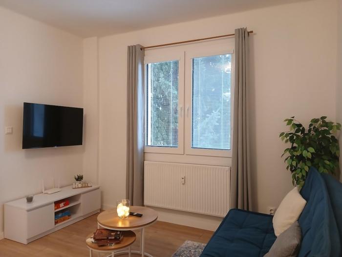 Sunny City Center Apartment with Balcony