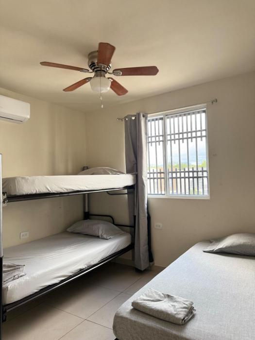 House with 2 bedrooms, 1 full bathroom and 1 guest bathroom, AC And Wi-Fi
