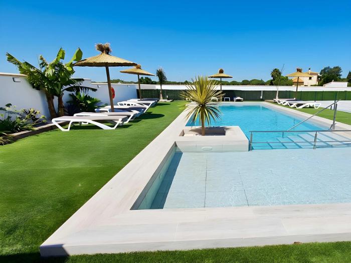 Apartamento con piscina compartida y parking gratis cerca de Tartessus