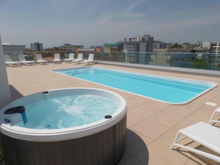 Contemporary flat in residence with pool