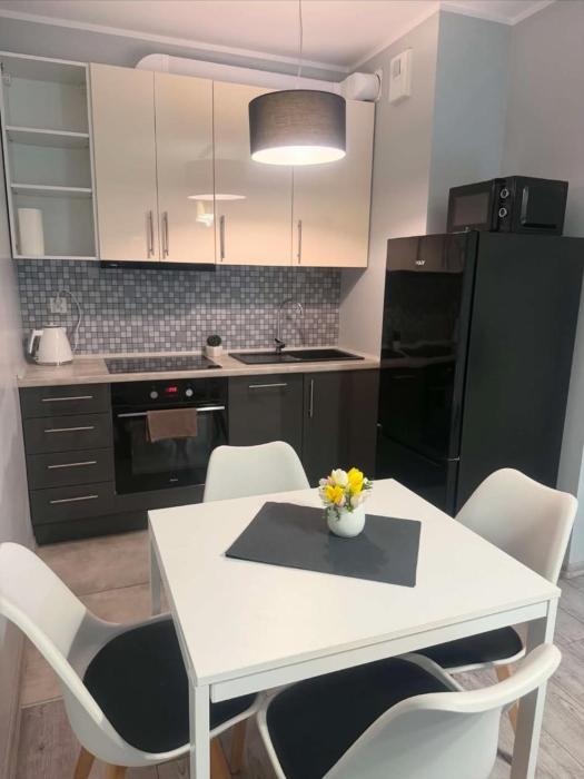 Apartament Strefa Czasu z wewnętrznym ogrodzonym parkingiem