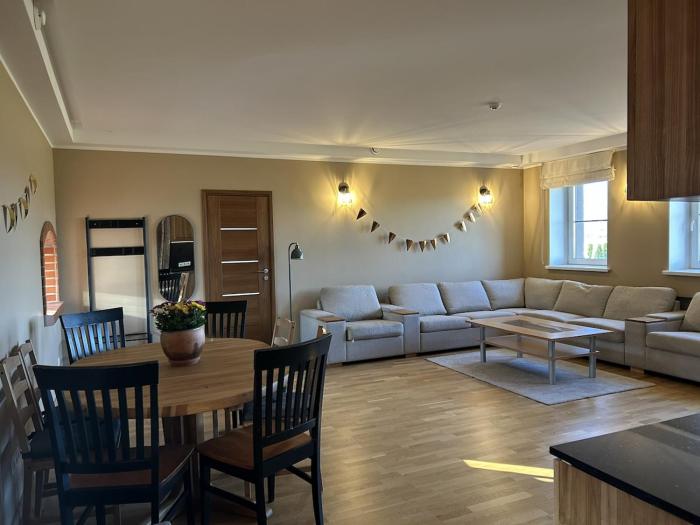 A cozy and spacious three-bedroom semi-detached house awaits guests
