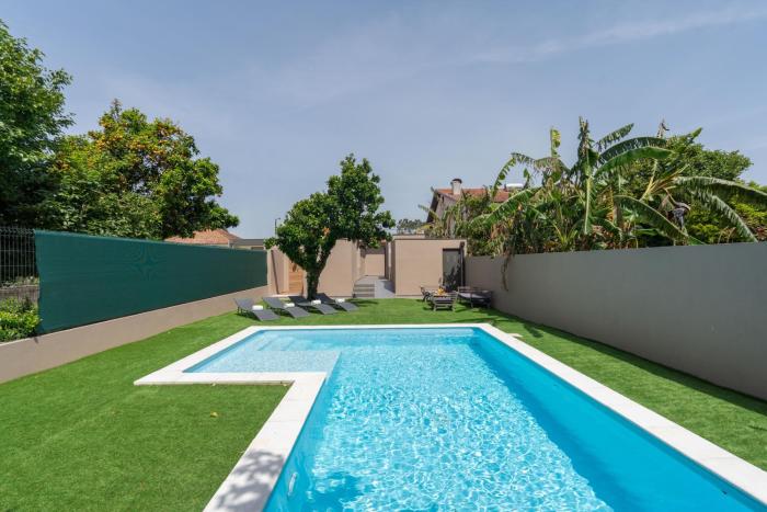 Cozy Apartments with Pool Near Airport by HostWise