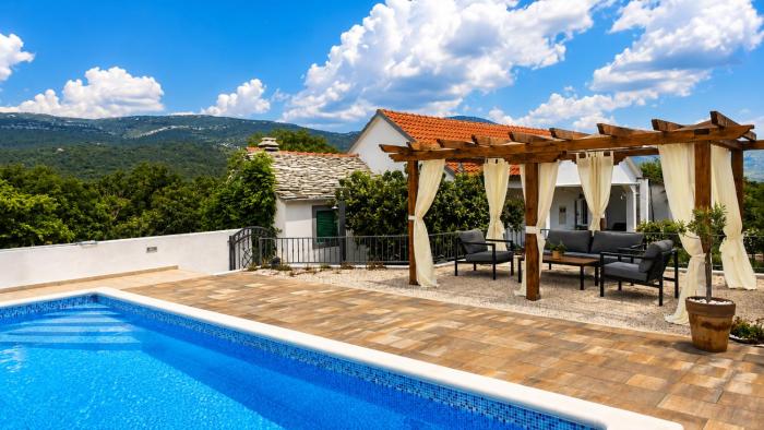 House Camellia with fenced pool and playground