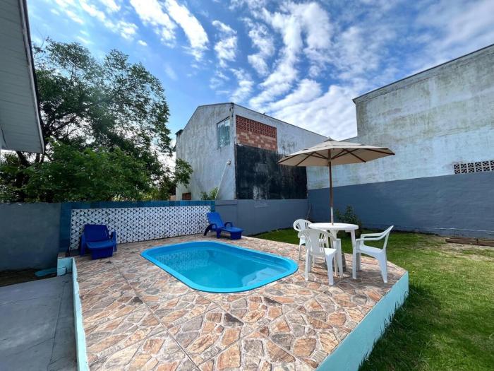 CASA COM PISCINA PARA TEMPORADA EM GUARATUBA Pr
