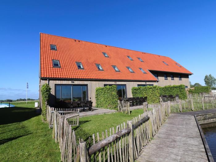 Two adjacent luxury villas in Friesland