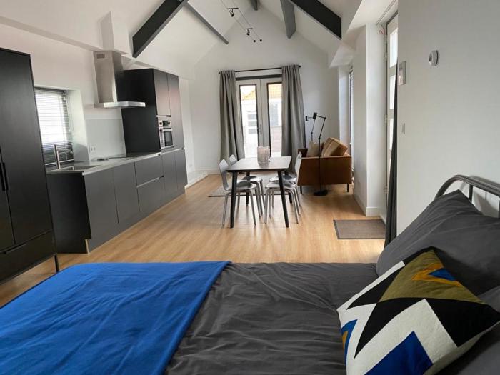 Luxe studio in het centrum met dakterras