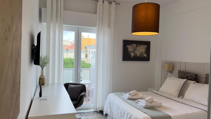 Quarto com casa de banho privativo