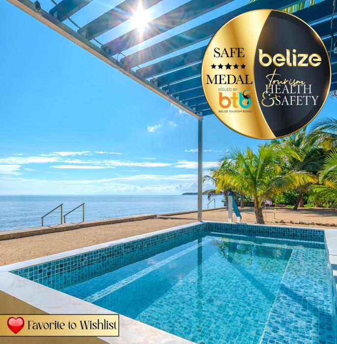 Entire Beach Home with Sunroom, Pool, Bikes, Paddleboards, BBQ, Snorkeling & more