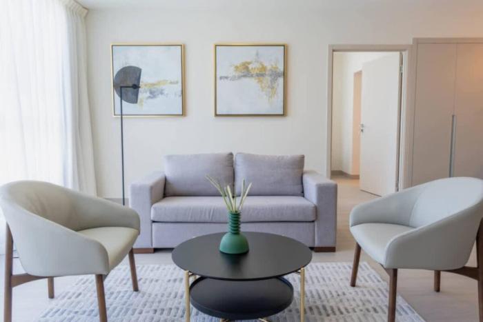 One-Bedroom Apartment with Coastal and City Views